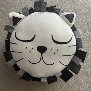 Pottery Barn Kids Emily Merrit “sleepy lion” pillow.